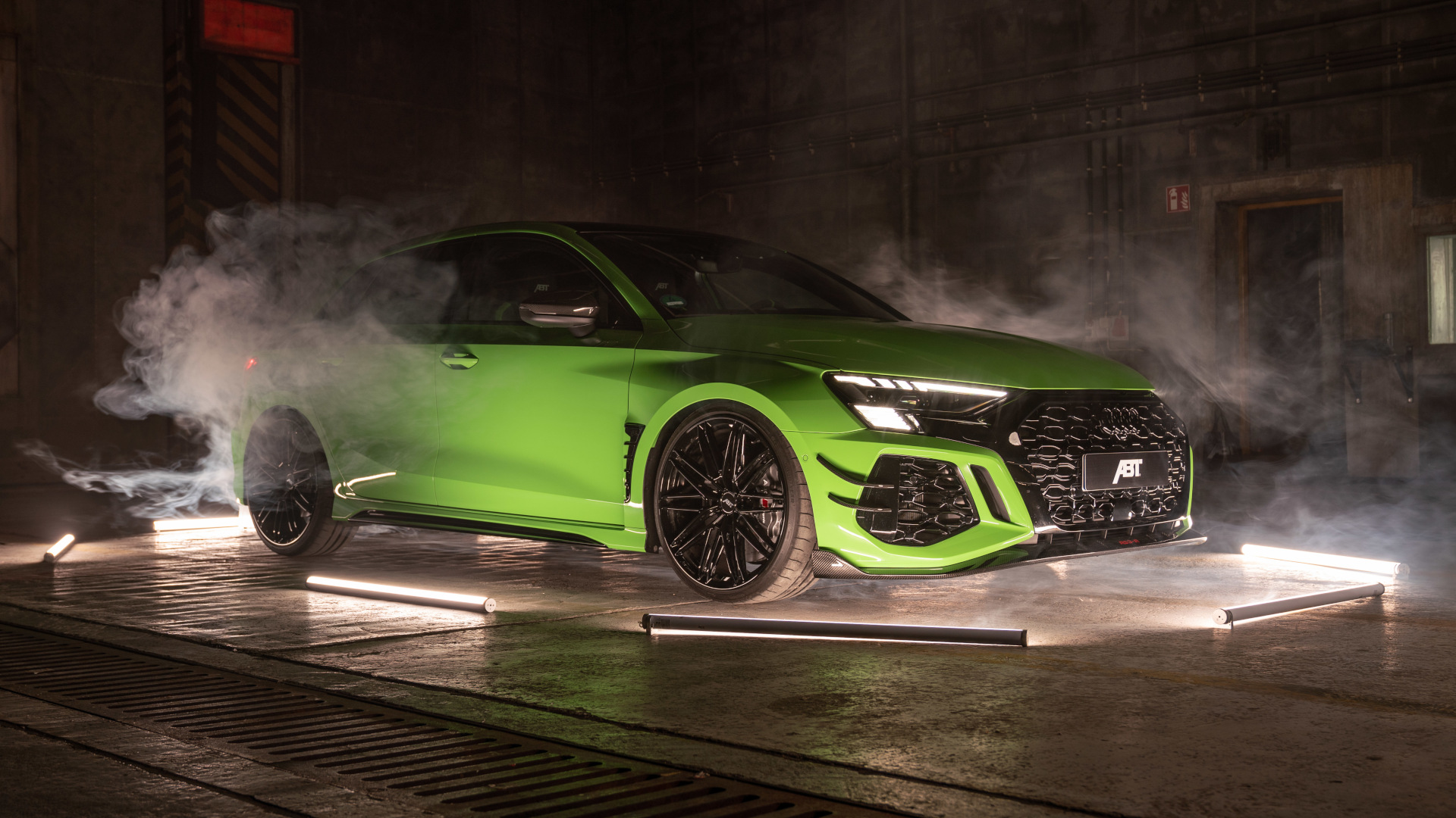 green RS3-R from the side front view in a dark room with light strips