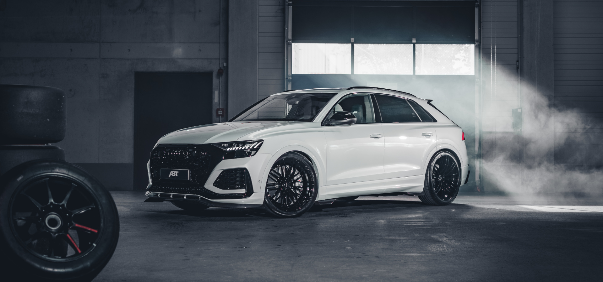 White RSQ8-S from the side view in a hall